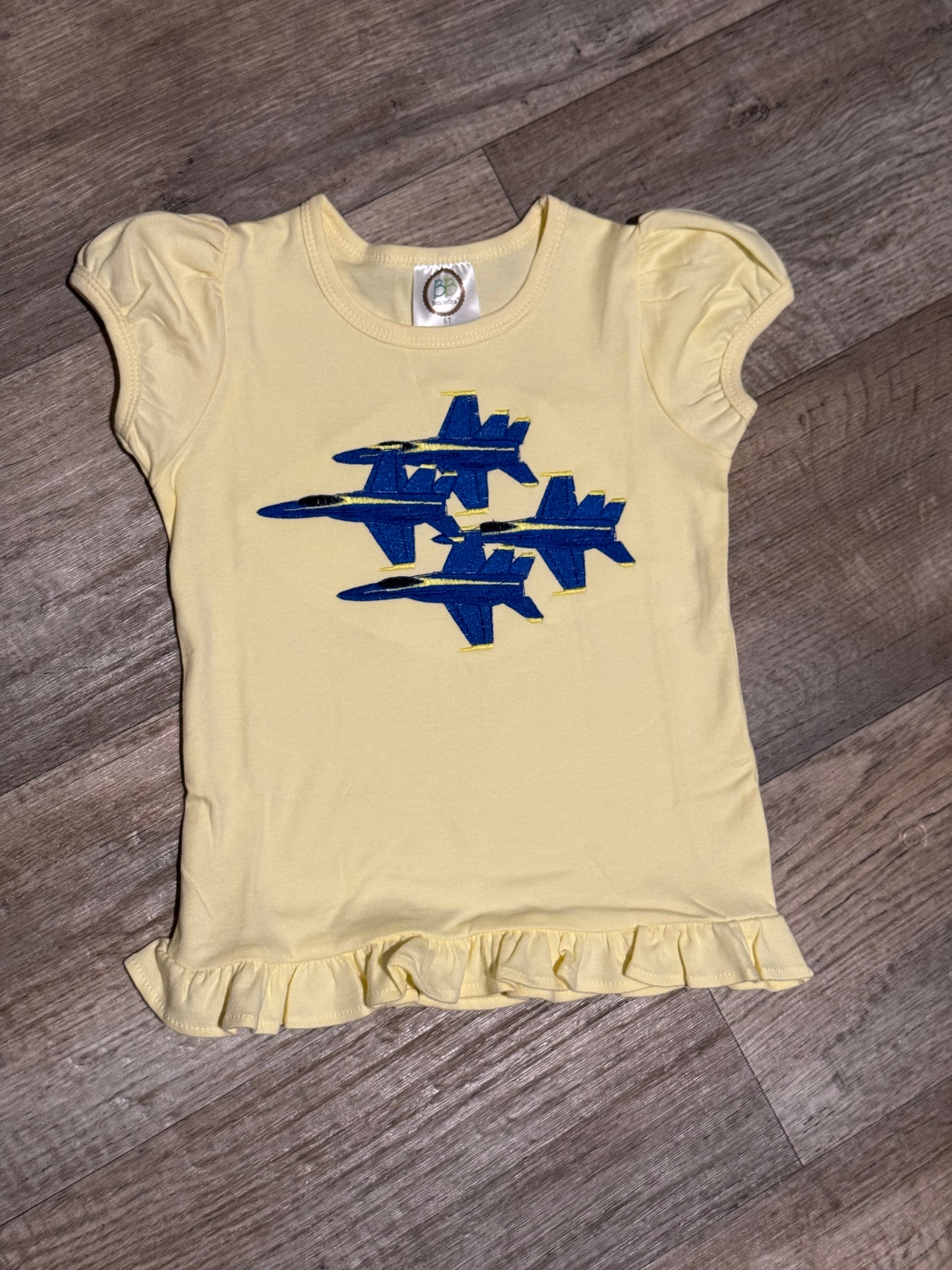 💙 Girls’ Ruffle Shirt – Blue Angels Four Diamond Embroidery 💛