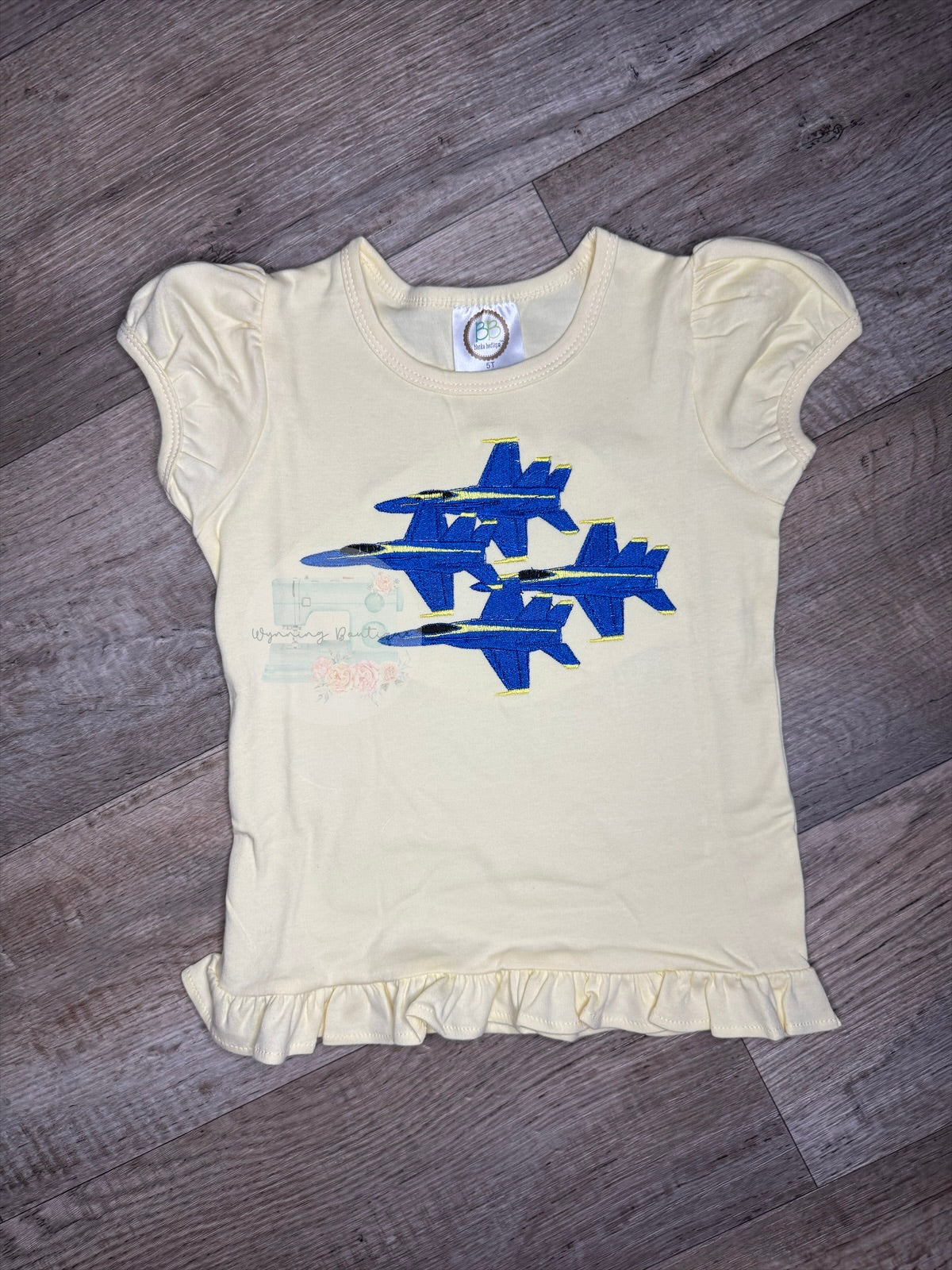 💙 Girls’ Ruffle Shirt – Blue Angels Four Diamond Embroidery 💛